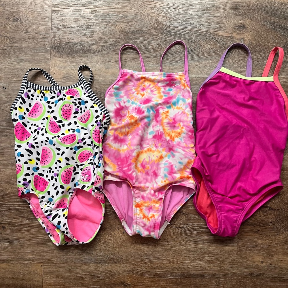 swimsuit set size 8. Dolfin uglies (watermelon suit) Speedo (tie dye/pink suit)
